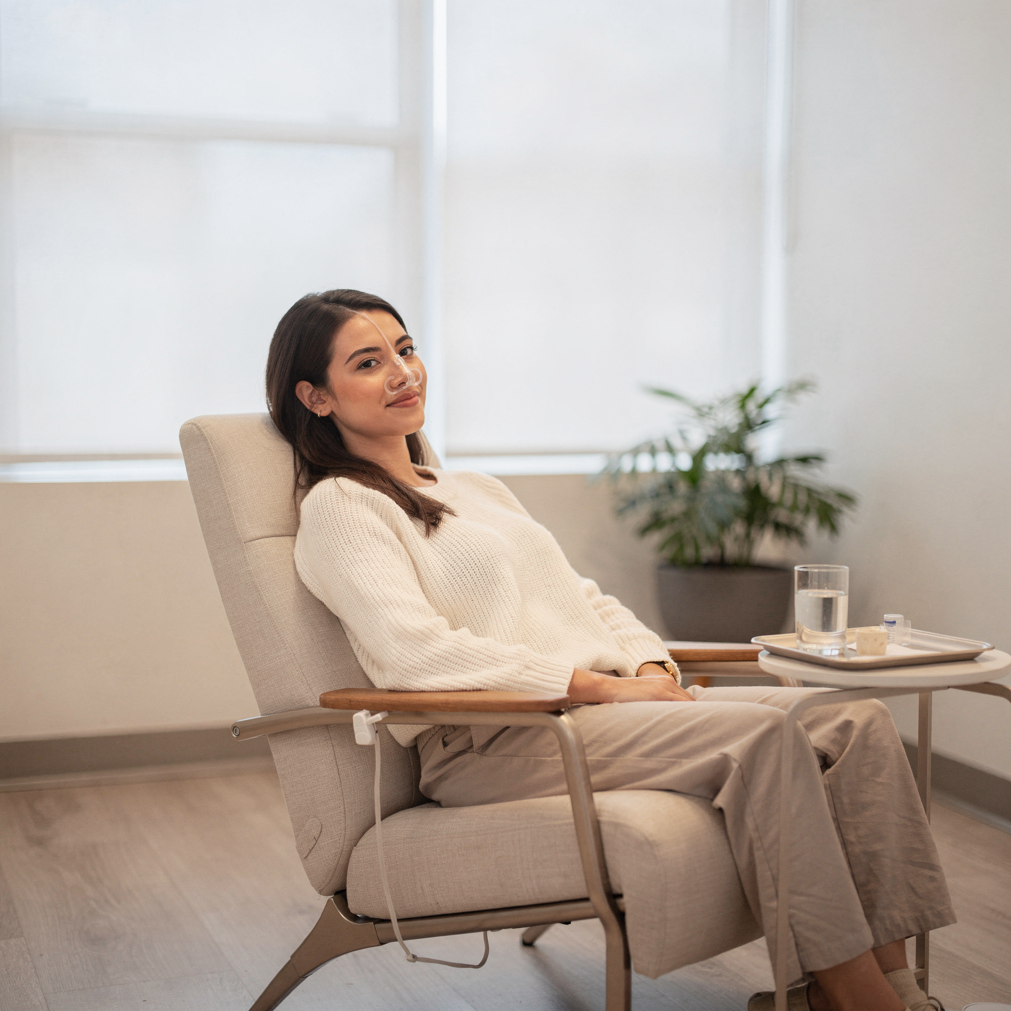 Patient relaxing in a comfortable chair during Spravato treatment at Neowellnez